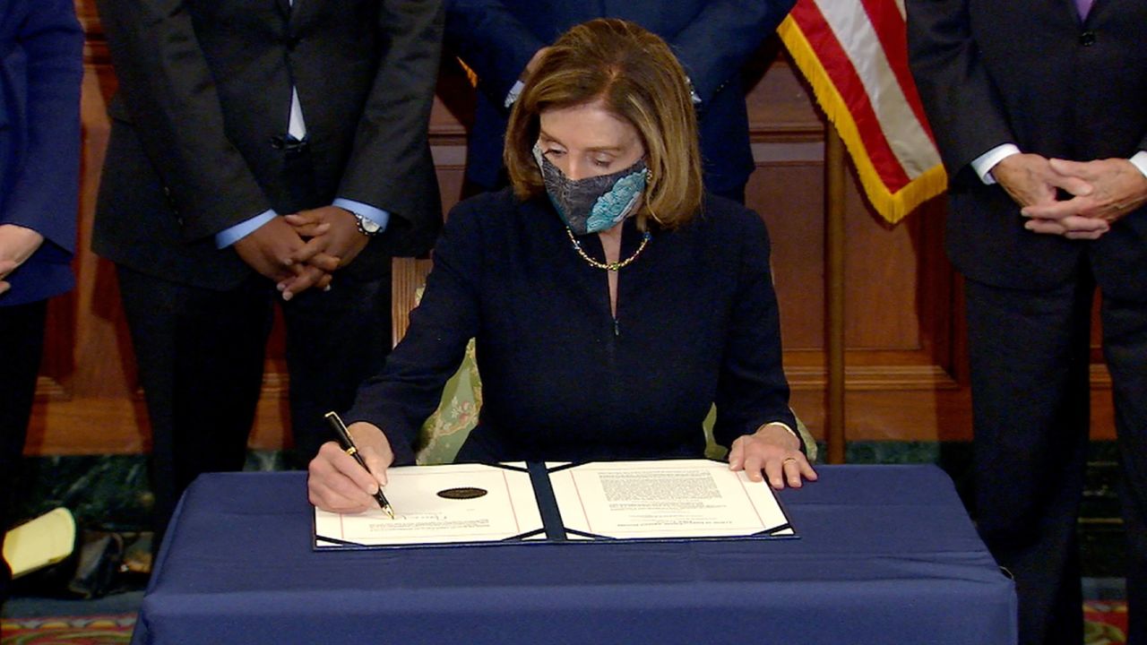 pelosi signs article of impeachment SCREEN GRAB