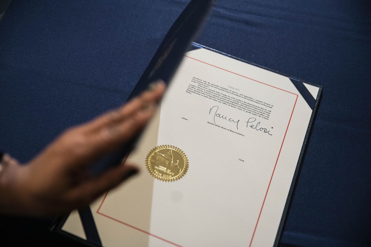 Pelosi's signature is seen on the article of impeachment.