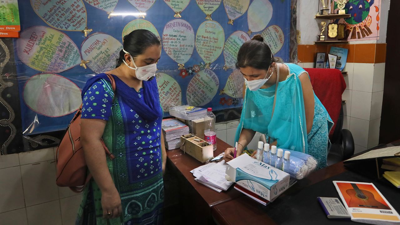 Indian government school teachers conducted surveys of residential neighborhoods in New Delhi, as part of their coronavirus duties during the pandemic.