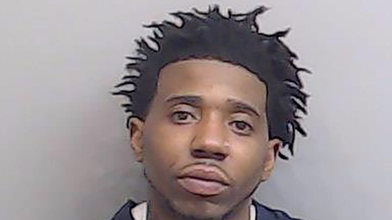 YFN Lucci has turned himself in and is currently at the Fulton County Jail, the Atlanta Police Department told CNN.