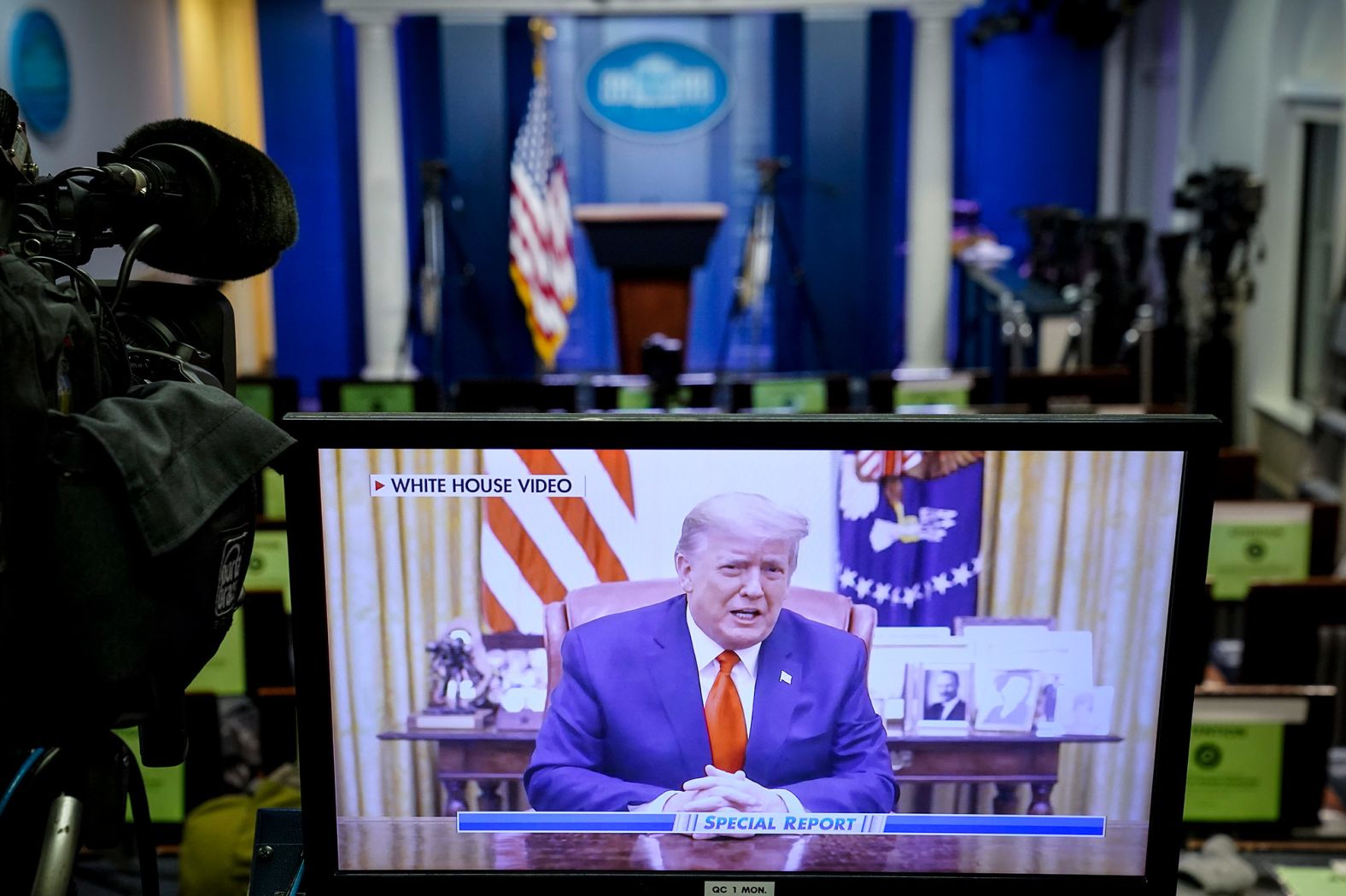 Trump is seen on a television monitor inside an empty press briefing room on January 13. <a href="index.php?page=&url=https%3A%2F%2Fwww.cnn.com%2Fpolitics%2Flive-news%2Fhouse-trump-impeachment-vote-01-13-21%2Fh_2fda1578621952f7f2a4d7378d4d9ab4" target="_blank">In a video message released after the vote,</a> Trump did not acknowledge his second impeachment. He instead called for peace and claimed that those who mobbed the Capitol are not his "true" supporters.