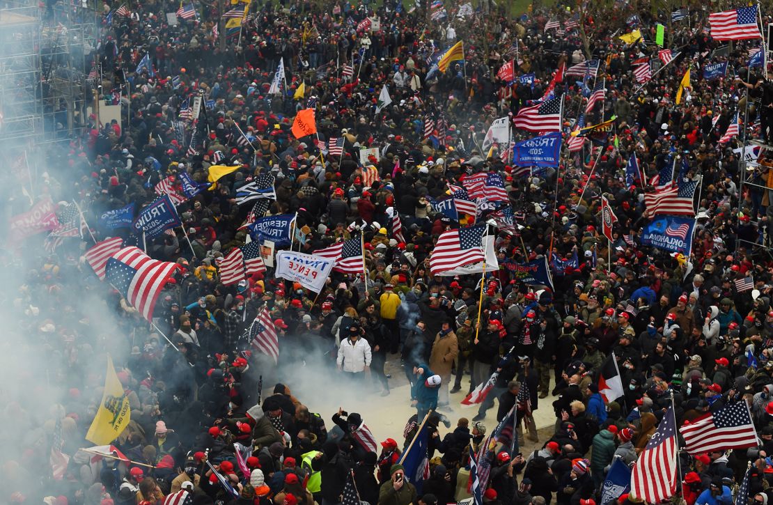 Trump supporters clash with police and security forces as they storm the US Capitol in Washington D.C on January 6, 2021.