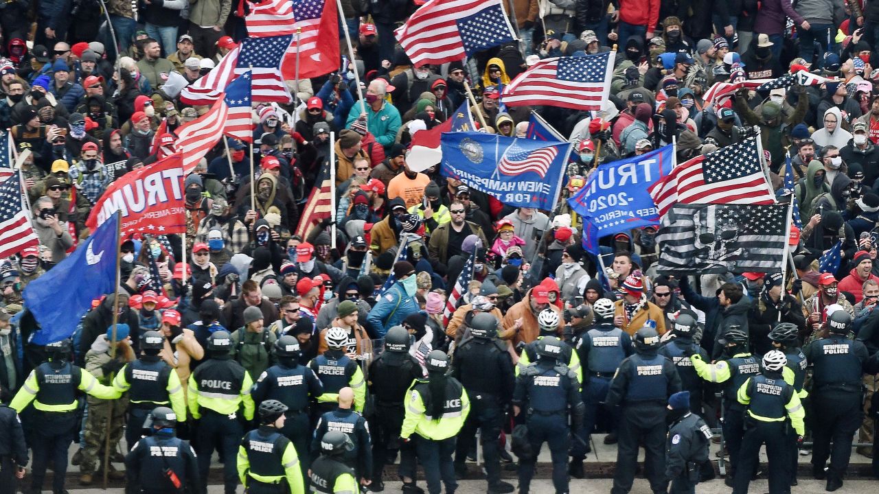 Trump supporters clash with police and security forces as they storm the Capitol on January 6.