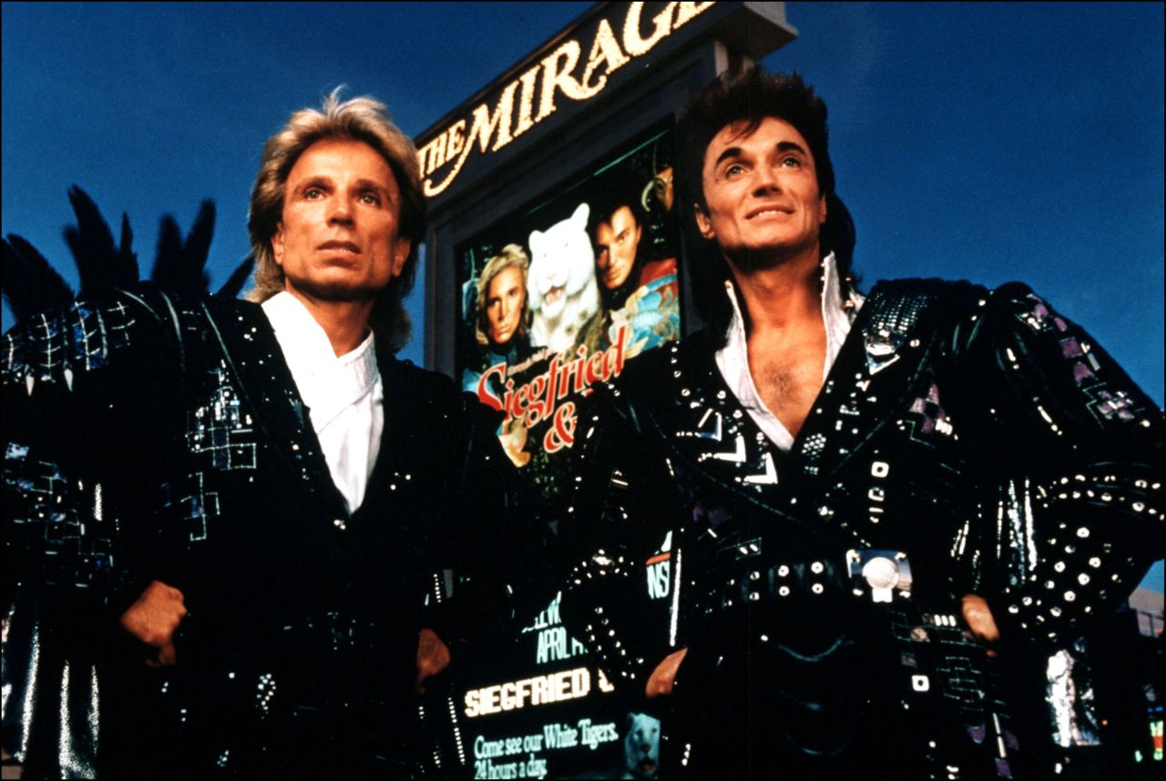 Siegfried Fischbacher, left, and Roy Horn pose outside The Mirage in Las Vegas in 1993. Their show regularly sold out during its run from 1990-2003.