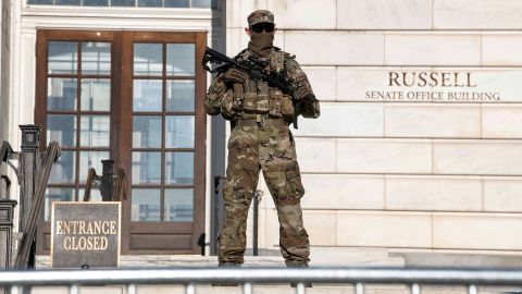 Armed National Guard troops are helping to secure government buildings and maintaining a perimeter around the US  Capitol. 