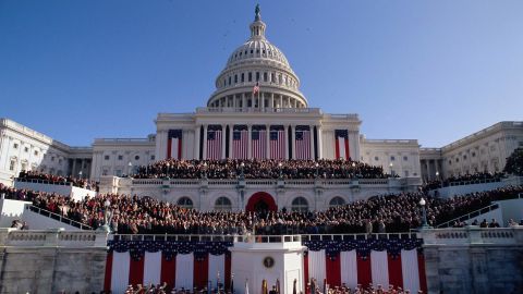 Spectators gather at the US Capitol Building to witness President Bill Clinton's first inauguration into office in 1993.