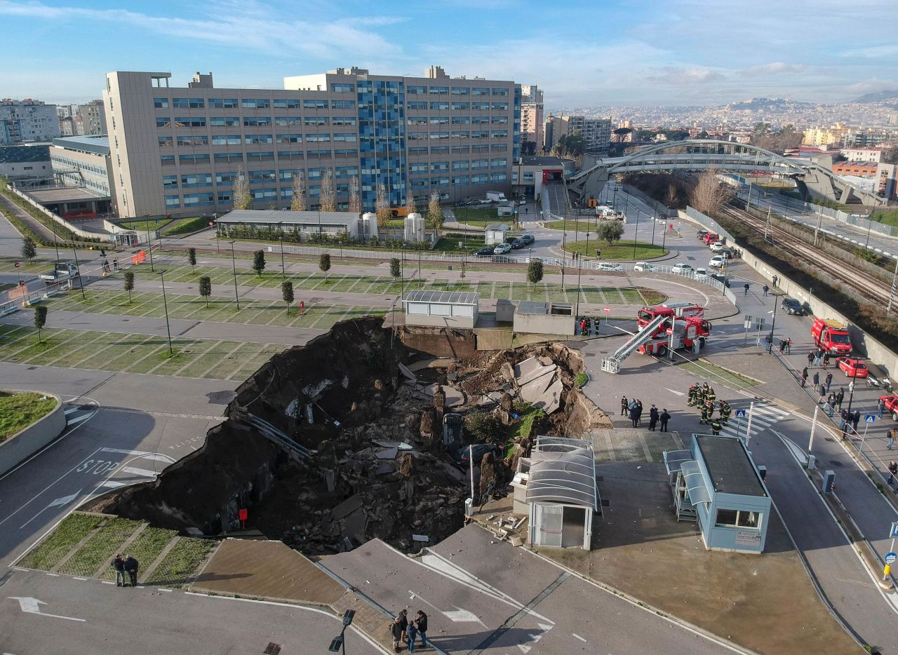 <a href="https://www.cnn.com/2021/01/08/europe/italy-hospital-sinkhole-scli-intl/index.html" target="_blank">A large sinkhole</a> is seen in the parking lot of Sea Hospital in Naples, Italy, on Friday, January 8. The sinkhole swallowed several cars and forced the evacuation of the hospital's Covid-19 ward. 