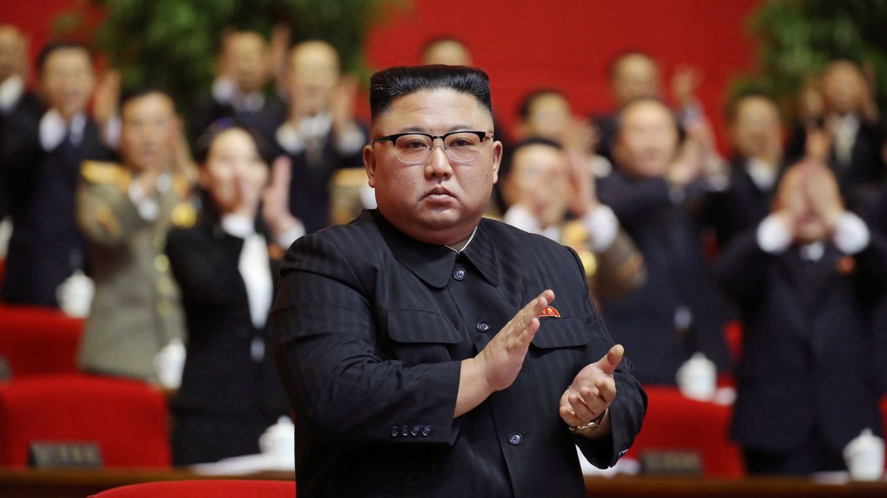 Kim Jong Un claps his hands at the Workers' Party Congress on Sunday, January 10.