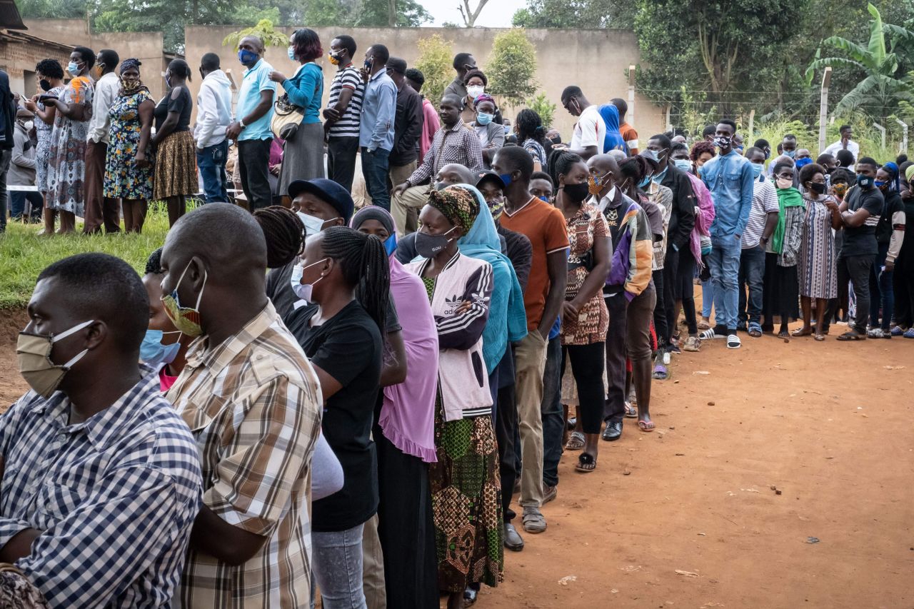 Voters queue at a polling station in Magere, Uganda, on Thursday, January 14, following a <a href="https://www.cnn.com/2021/01/14/africa/uganda-vote-internet-shutdown-intl/index.html" target="_blank">tense presidential campaign</a> marred by violence and deaths in the lead-up to the election.