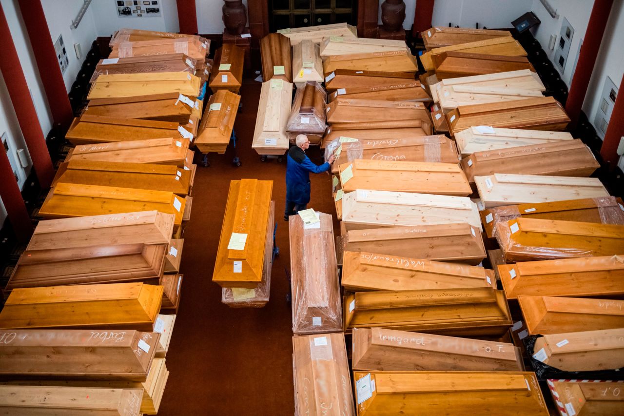 An employee moves coffins at a crematorium in Meissen, Germany, on Wednesday, January 13. 