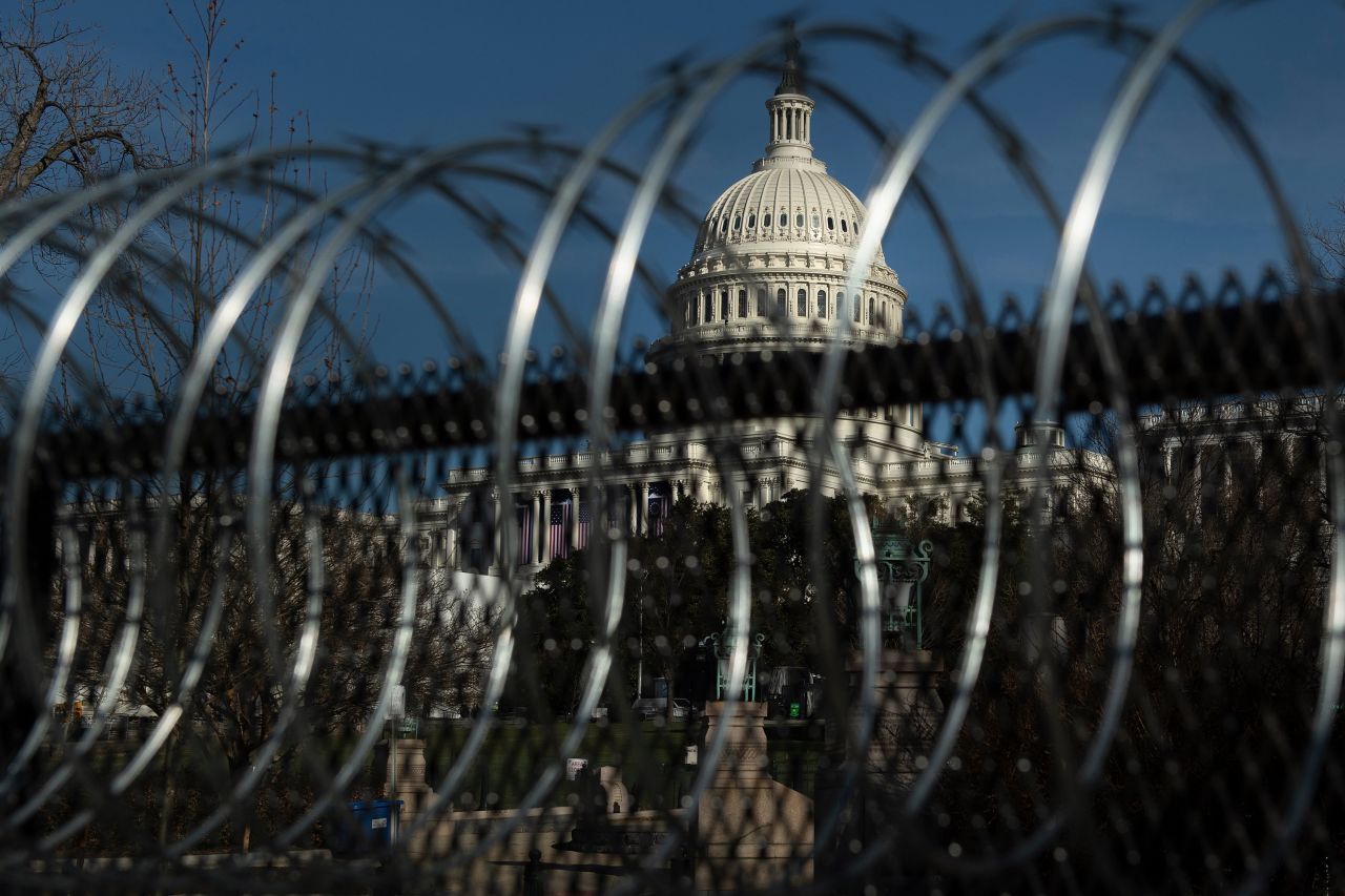 Razor wire is seen topping a security fence near the Capitol on Thursday, January 14, in preparation for next week's presidential inauguration in Washington, DC.