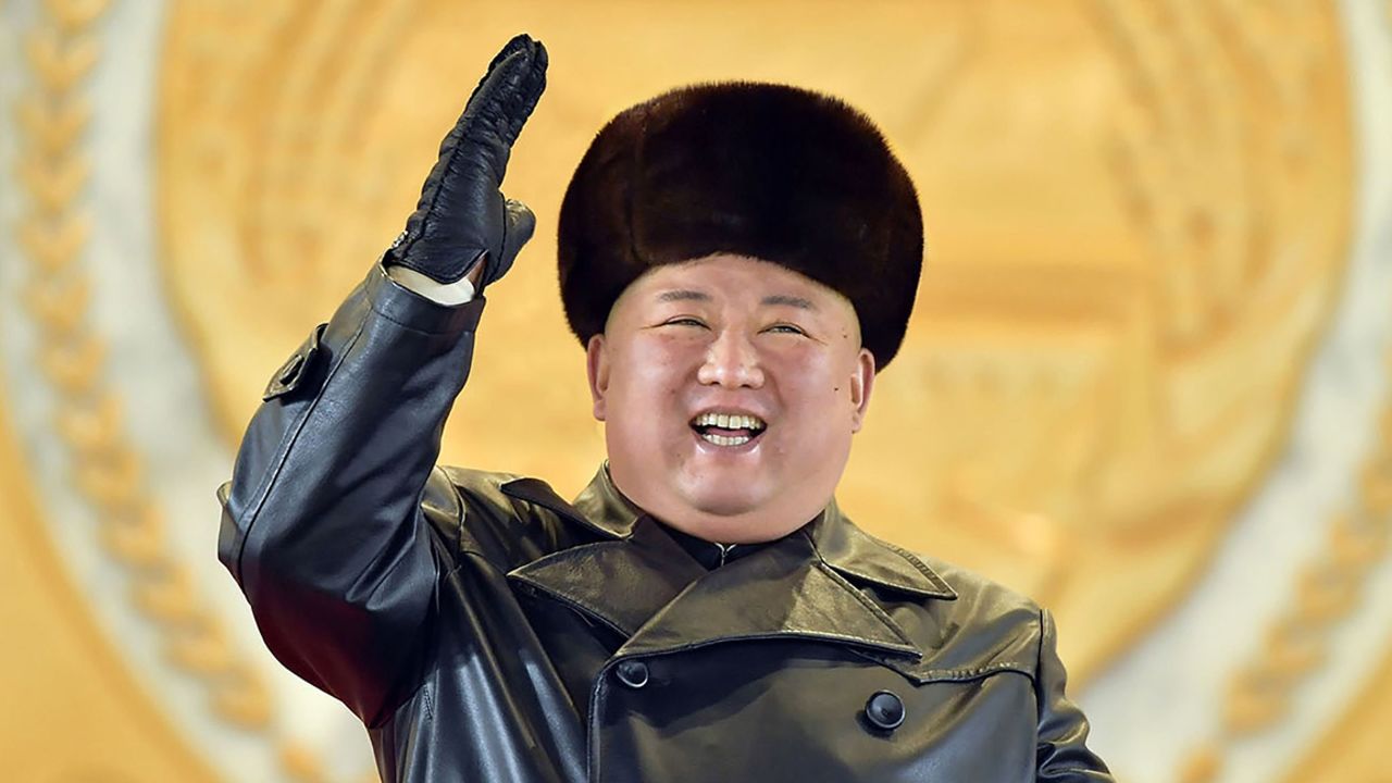North Korean leader Kim Jong Un gesturing from the tribune during a military parade on Thursday.