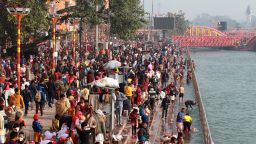 Indian Hindu devotees gather at a ghat of the River Ganges during Makar Sankranti, a day considered to be great religious significance in Hindu mythology, on the first day of the religious Kumbh Mela festival in Haridwar on January 14, 2021.