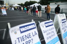 People wait in line to receive a Covid-19 vaccine at Disneyland Resort on January 13.