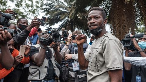 Bobi Wine poses for a photograph after casting his ballot during the presidential election at a polling station in Magere