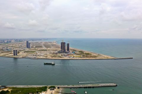 Work began on the multi-billion-dollar Eko Atlantic project, which is set to transform Lagos, Nigeria's largest city, in 2009. The new financial hub, occupying 10 square kilometers of reclaimed land, has space for up to 300,000 residents and 150,000 daily commuters. However, there have been concerns that the development of Eko Atlantic is causing coastal erosion, and could make neighboring areas vulnerable to flooding.