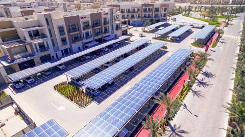 Buildings and parking lots are powered by solar panels.