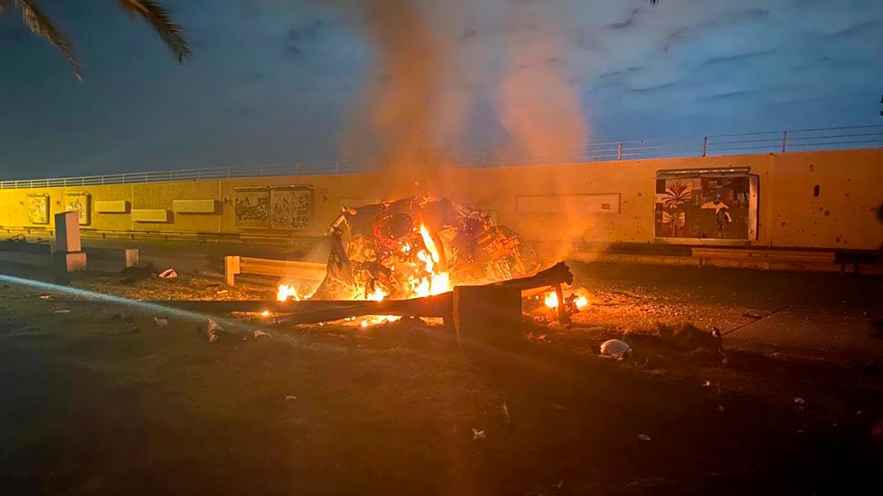 This photo, released by the Iraqi Prime Minister Press Office, shows a burning vehicle at the Baghdad International Airport following the US airstrike that killed Gen. Qasem Soleimani, the head of Iran's elite Quds Force, on January 3.