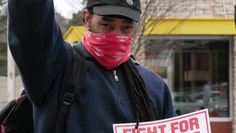 Umar Benson, a worker striking with Fight for $15 and a Union in Durham, NC on January 15, 2021.