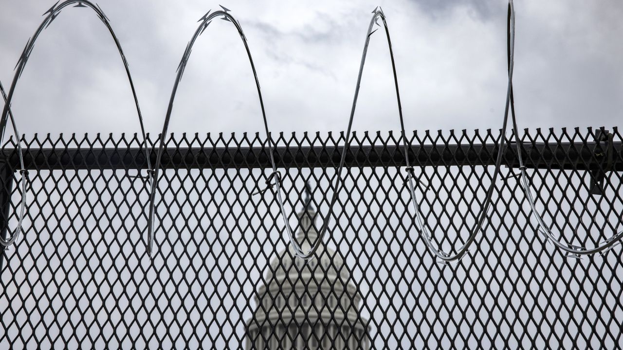 WASHINGTON, DC - JANUARY 15: Razor wire is seen after being installed on the fence surrounding the grounds of the U.S. Capitol on January 15, 2021 in Washington, DC. Due to security threats following last week's storming of the U.S. Capitol by a pro-Trump mob, law enforcement agencies have increased security measures along the National Mall and much of downtown Washington, DC, essentially closing down the Mall a week ahead of President-elect Joe Biden's inauguration. (Photo by Samuel Corum/Getty Images)