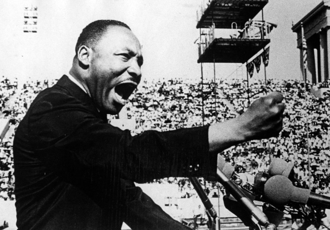 Dr. Martin Luther King Jr. gestures emphatically during a speech at a Chicago Freedom Movement rally in Soldier Field, Chicago, Illinois, July 10, 1966.