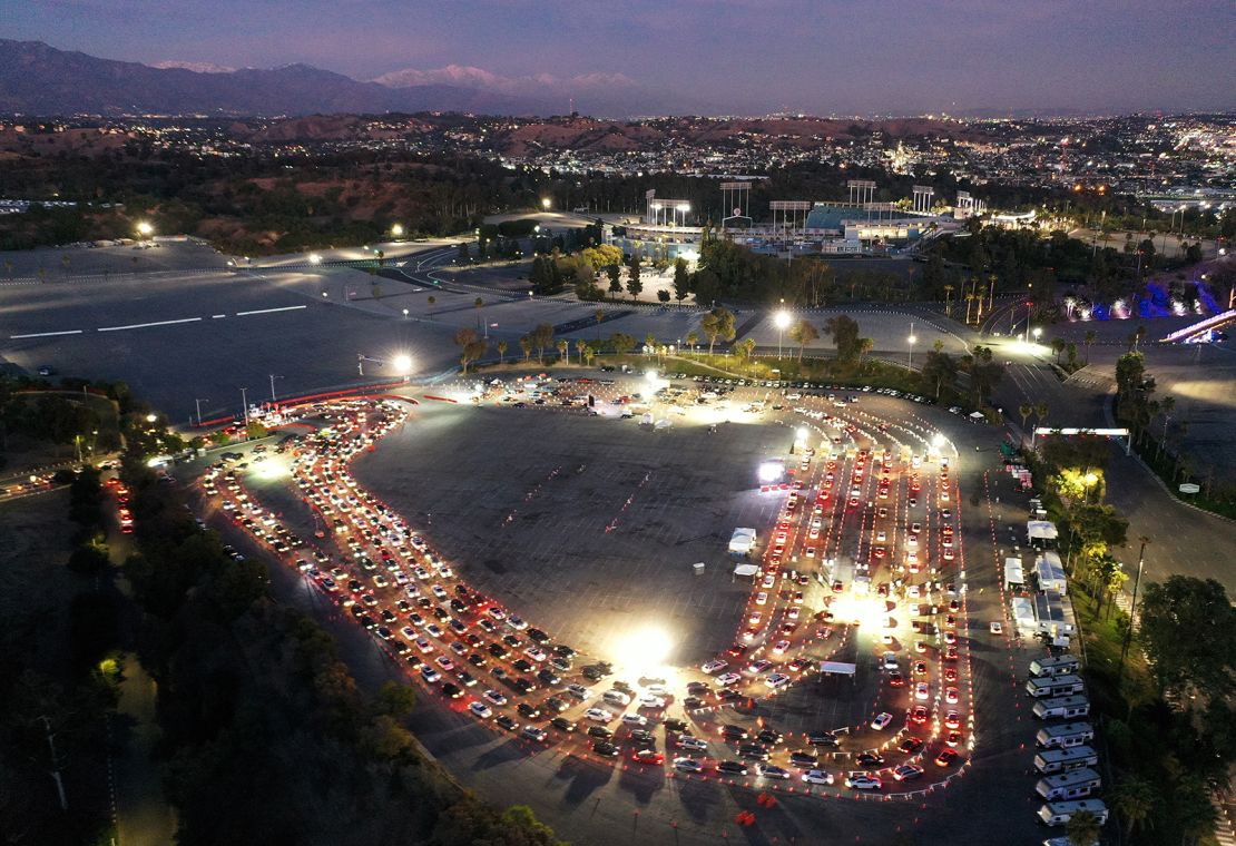 Vehicles line up at a Covid-19 testing site at Dodger Stadium in Los Angeles. 