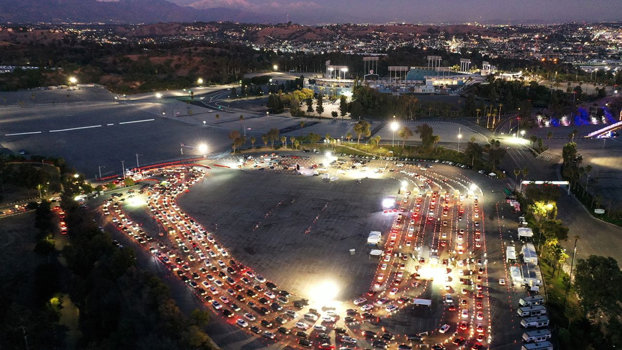 Vehicles line up at a Covid-19 testing site at Dodger Stadium in Los Angeles.