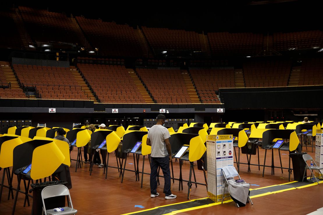 Voters cast ballots at The Forum arena in Inglewood, California.