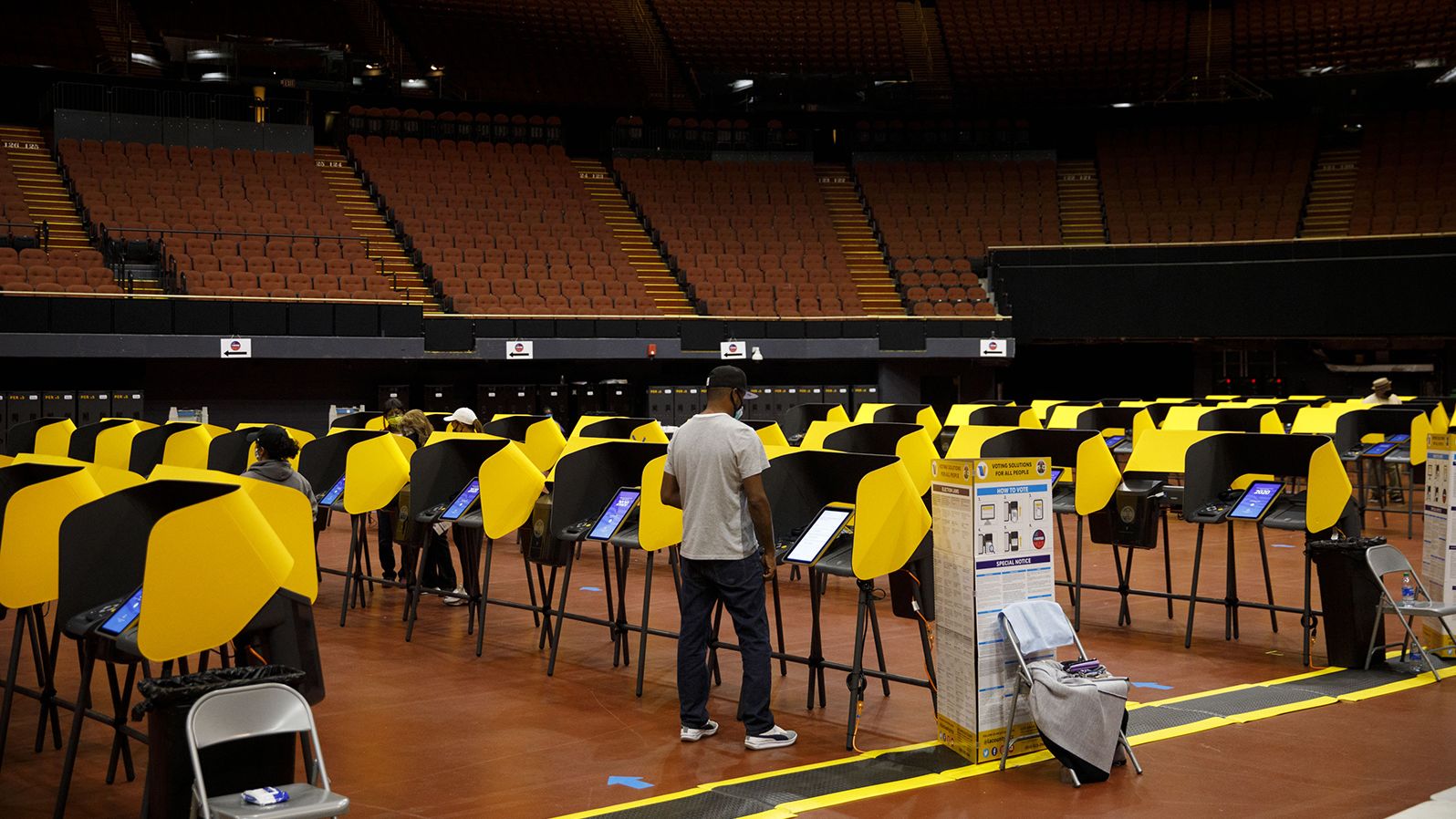 Voters cast ballots at The Forum arena in Inglewood, California.