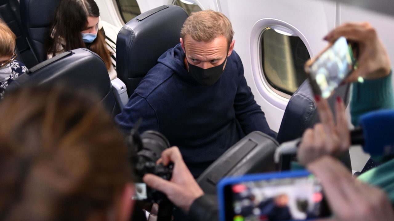 Russian opposition leader Alexei Navalny is seen in a Pobeda plane after it landed at Moscow's Sheremetyevo airport on January 17, 2021.