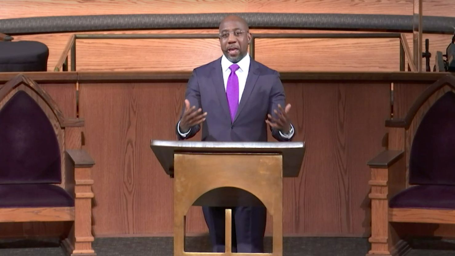 The Rev. Raphael Warnock delivers a sermon as the senior pastor at Atlanta's Ebenezer Baptist Church on Sunday, January 17.