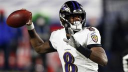 Baltimore Ravens quarterback Lamar Jackson (8) throws a pass for an interception during the second half of an NFL divisional round football game against the Buffalo Bills Saturday, Jan. 16, 2021, in Orchard Park, N.Y. The Bills won 17-3. (AP Photo/Jeffrey T. Barnes)