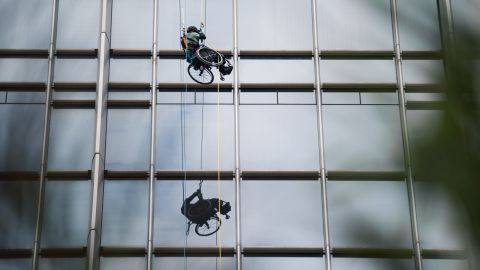 Paraplegic athlete Lai Chi-wai attempting to climb the 89-storey Nina Tower in Tsuen Wan, Hong Kong, on January 16.