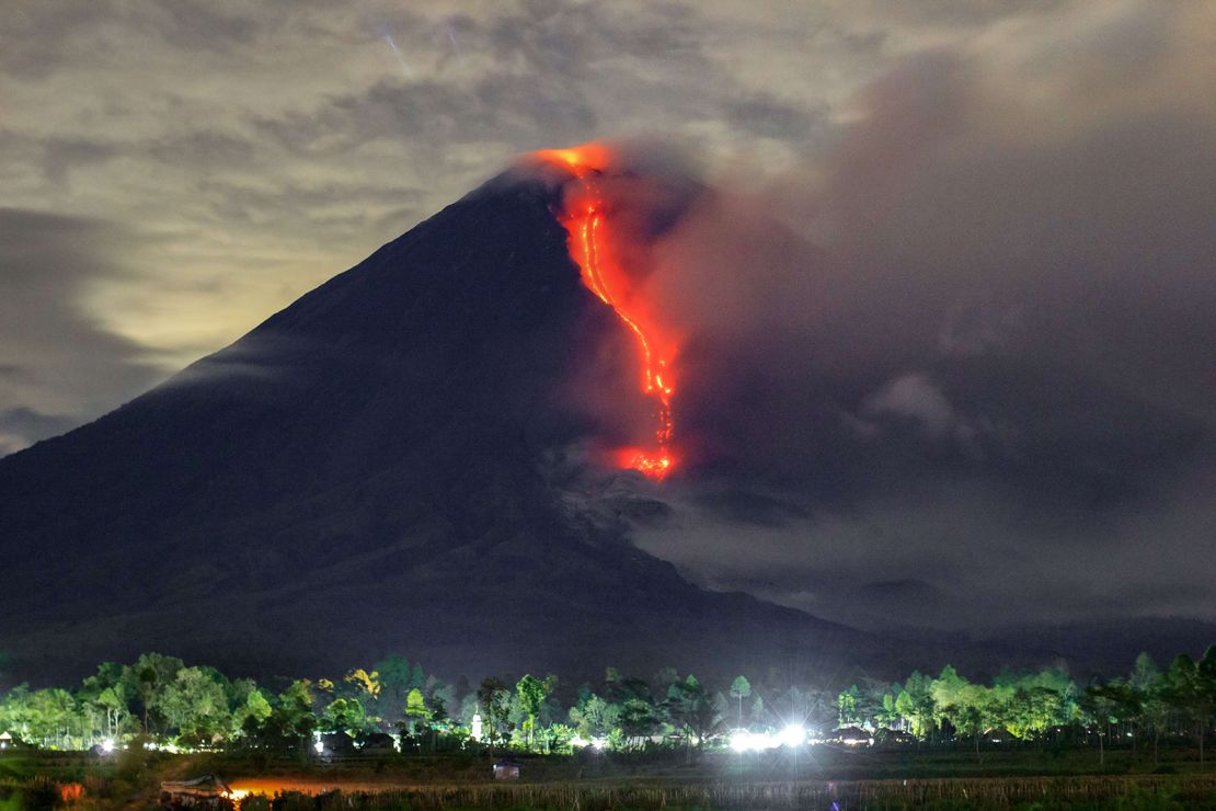 In this picture taken on January 16, 2021, lava is seen during an eruption of Mount Semeru in Lumajang, East Java. 