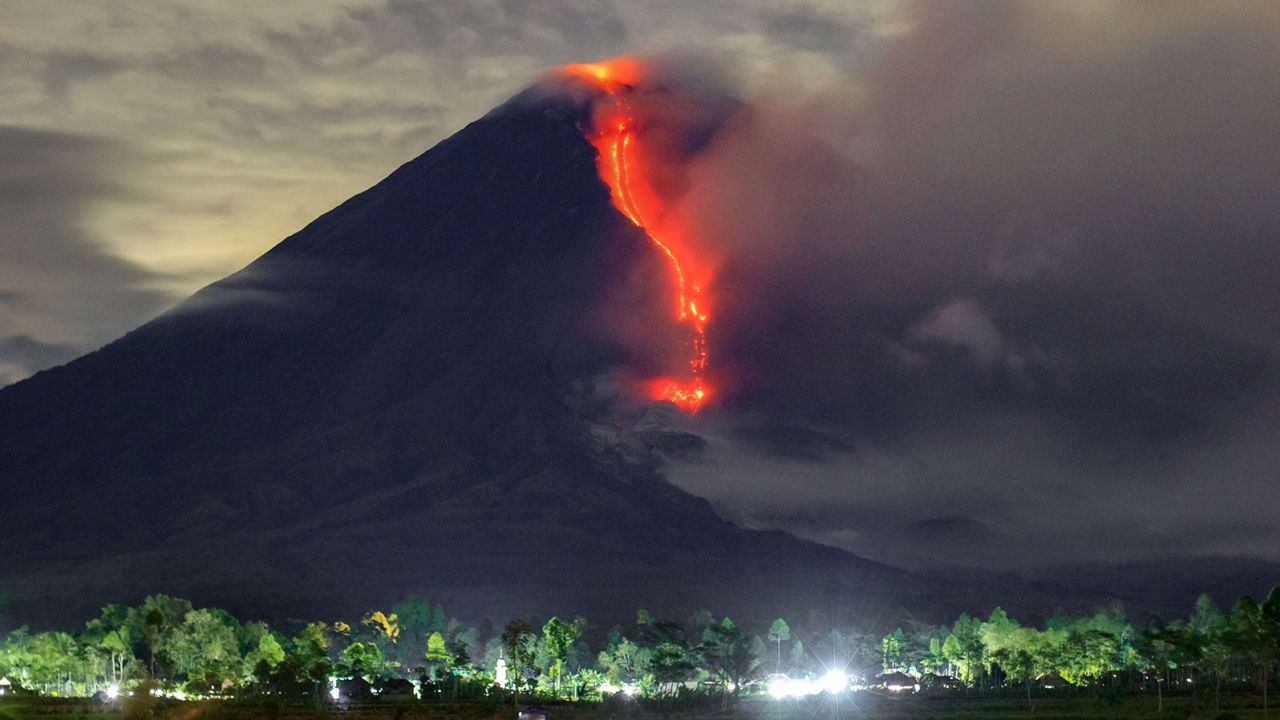 In this picture taken on January 16, 2021, lava is seen during an eruption of Mount Semeru in Lumajang, East Java.