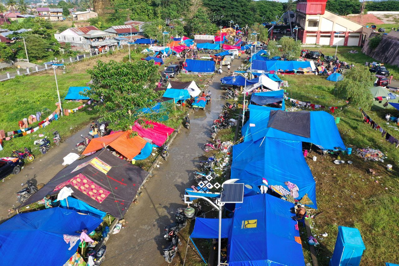 An aerial picture shows a temporary shelter for people affected by the  6.2 magnitude earthquake in Mamuju, West Sulawesi, Indonesia, on Monday, January 18.