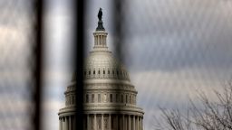 WASHINGTON, DC - JANUARY 17: The U.S. Capitol dome is seen beyond a security fence on January 17, 2021 in Washington, DC. After last week's riots at the U.S. Capitol Building, the FBI has warned of additional threats in the nation's capital and in all 50 states. According to reports, as many as 25,000 National Guard soldiers will be guarding the city as preparations are made for the inauguration of Joe Biden as the 46th U.S. President.  (Photo by Michael M. Santiago/Getty Images)