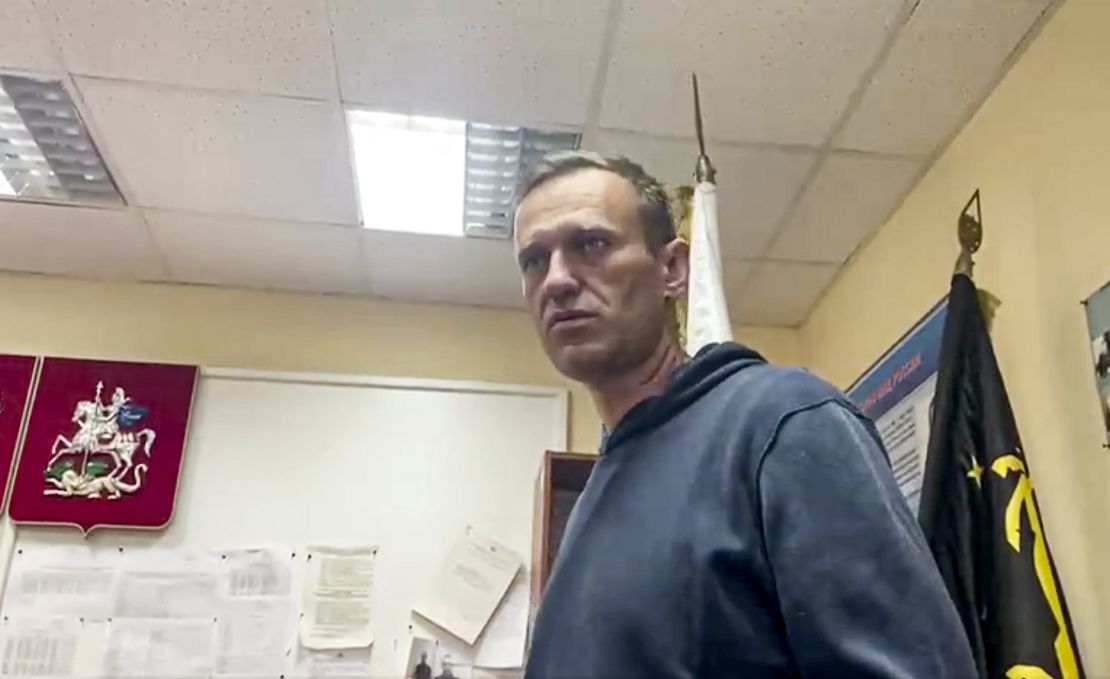 Navalny waits for a court hearing in the police station on Monday.