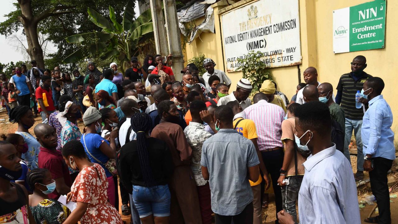 Applicants queue to get national identity numbers at the National Identity Management Commission office in Ikeja on December 30