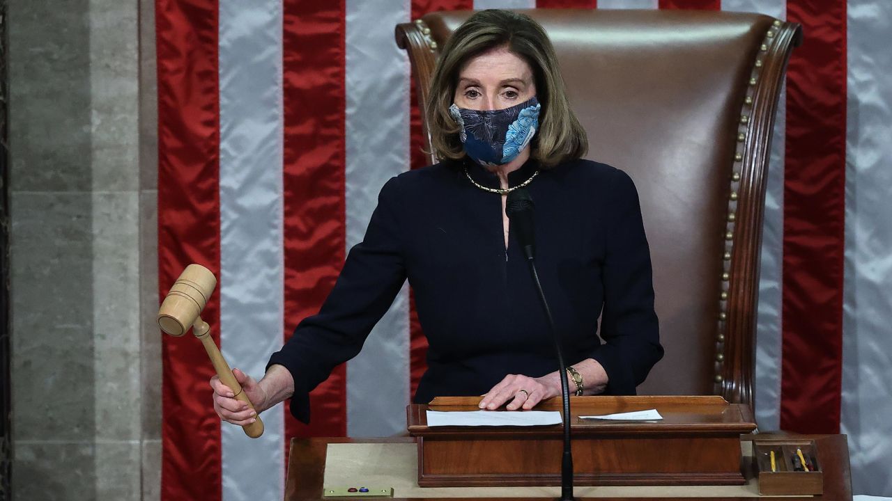 Speaker of the House Nancy Pelosi raps her gavel after the House voted to impeach U.S. President Donald Trump for the second time in little over a year.