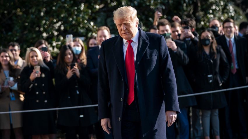 Trump turns to reporters as he exits the White House to walk toward Marine One on the South Lawn on January 12, 2021 in Washington, DC.