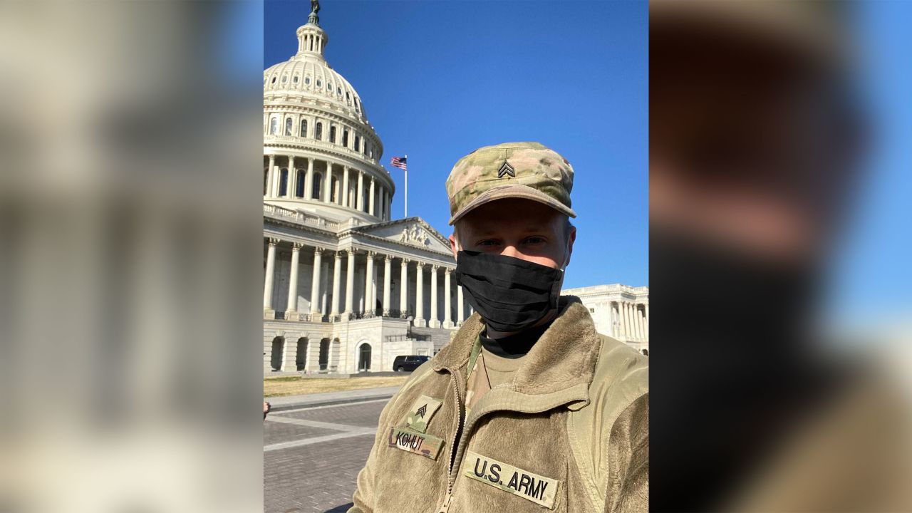 02 national guardsman teaches band in back of humvee