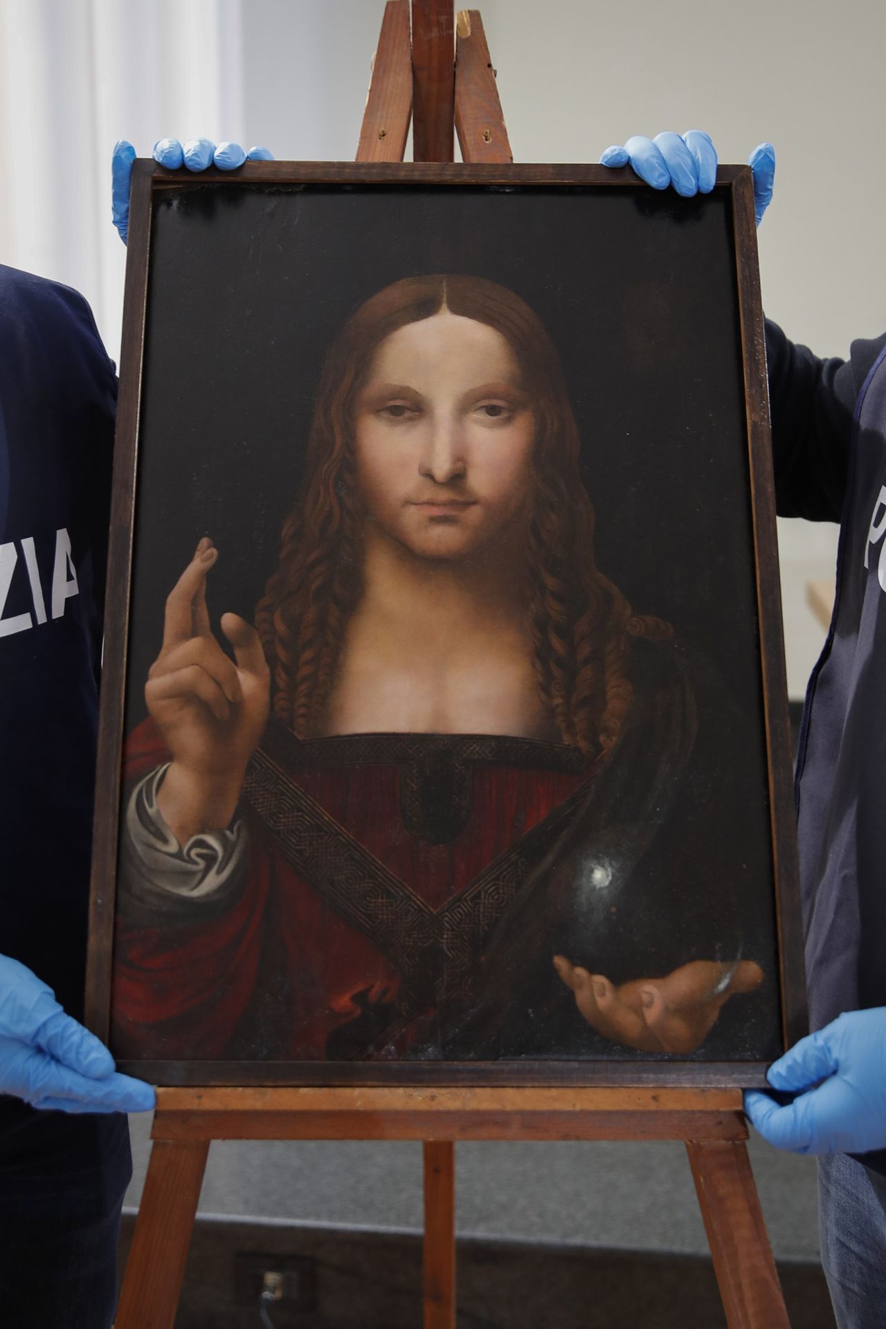 Italian police present the recovered painting, which is believed to date back to the 1510s.