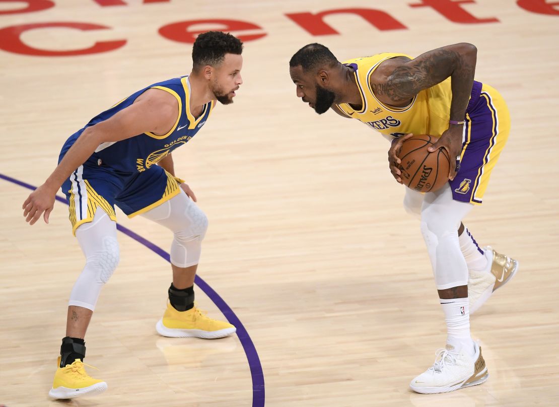 LeBron James is guarded by Stephen Curry on Monday. 