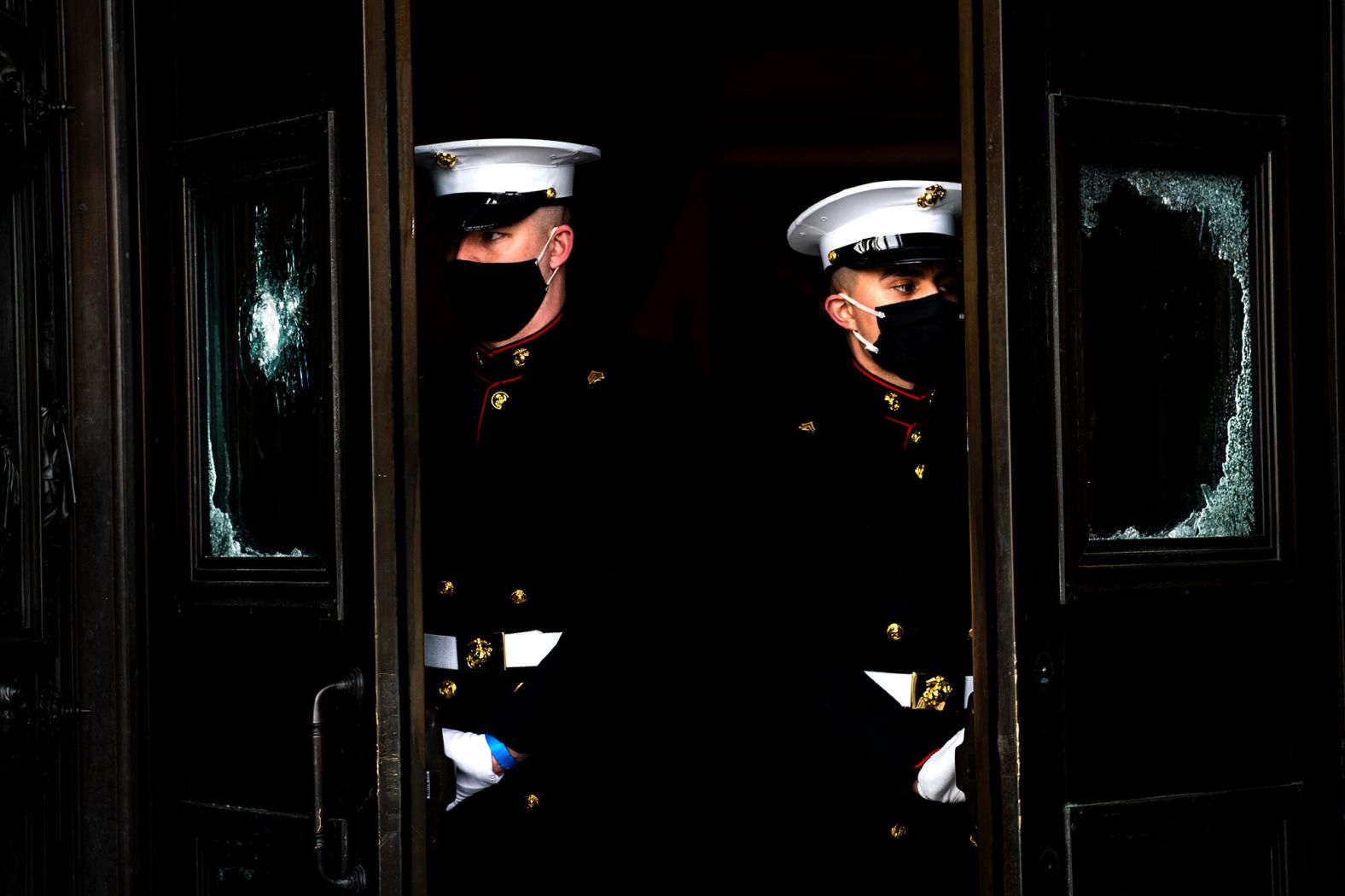 US Marines are posted on the East Front steps of the Capitol.