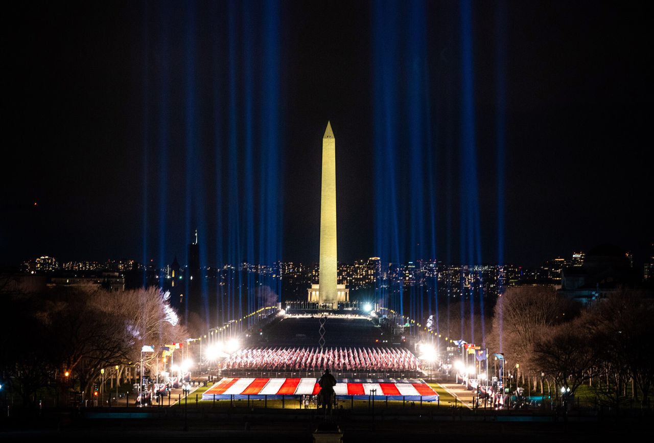 Lights are displayed above the National Mall two days before the inauguration, paying tribute to all the Americans who have died from Covid-19.