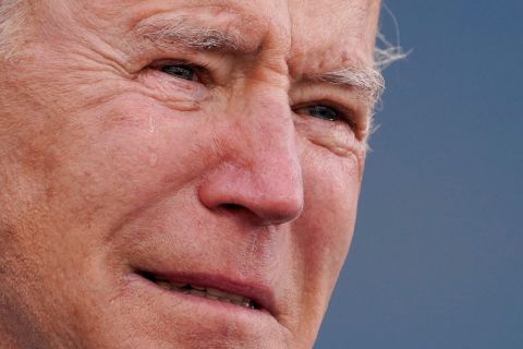 Biden tears up in New Castle, Delaware, as he speaks about his late son Beau before heading to Washington, DC, on the day before the inauguration. Biden said he was proud to be delivering <a href="https://www.cnn.com/politics/live-news/biden-inauguration-dc-security-01-19-21/h_a7f0252ff11d798238c580e29f0cb89e" target="_blank">his send-off remarks</a> from the National Guard Center in New Castle, which is named after Beau Biden. "I only have one regret: that he's not here, because we should be introducing him as president," Biden said.