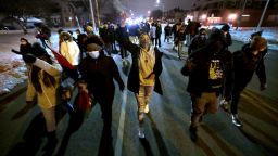Marchers make their way down 52nd Street through Kenosha on Tuesday, Jan. 5, 2021, after an announcement from the DA that there will be no charges against officers in the shooting of Jacob Blake. MJS-causey column07p1