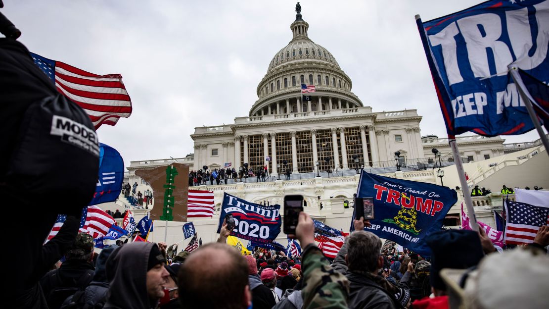 Pro-Trump supporters storm the US Capitol following a rally with President Donald Trump on January 6, 2021 in Washington, DC. 