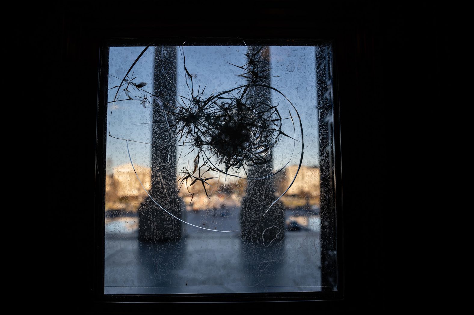 A broken window is seen at the Capitol, which was still showing damage from when pro-Trump rioters breached the building on January 6.